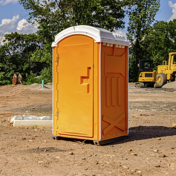 what is the cost difference between standard and deluxe portable toilet rentals in Trumbull